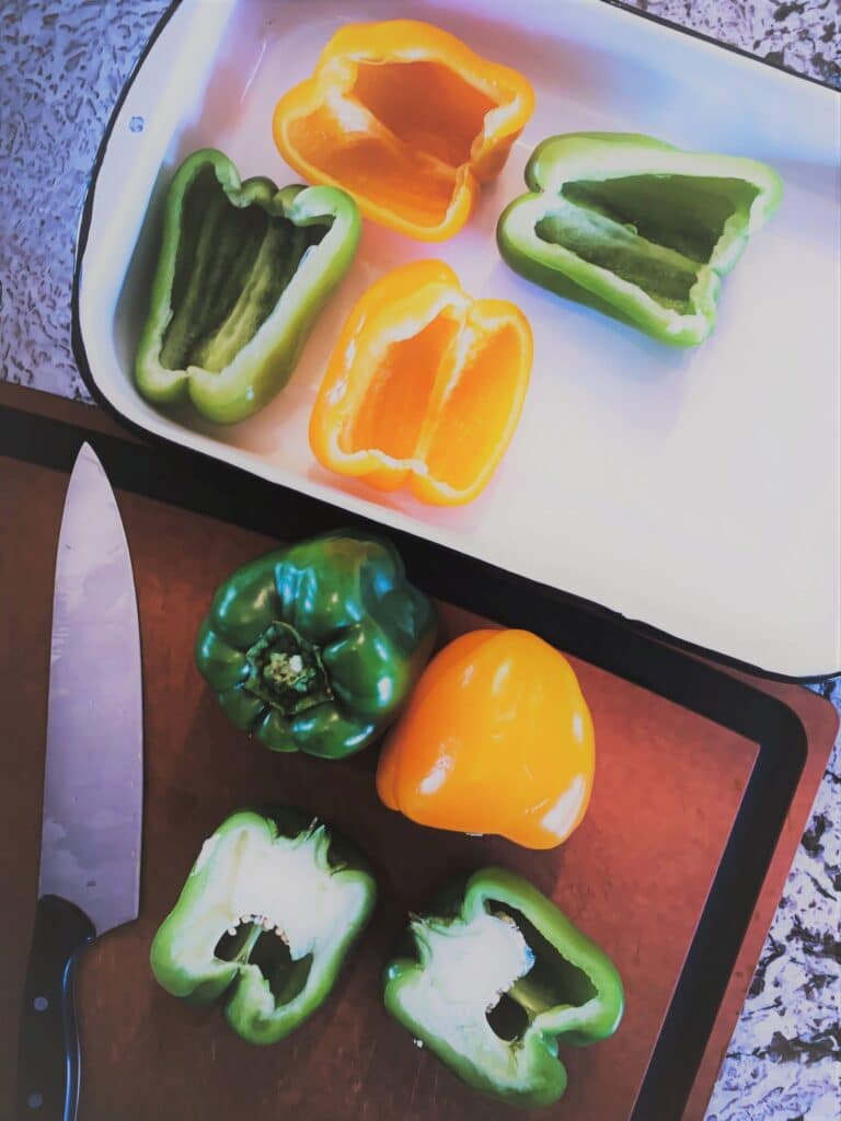 halved green and orange bell peppers